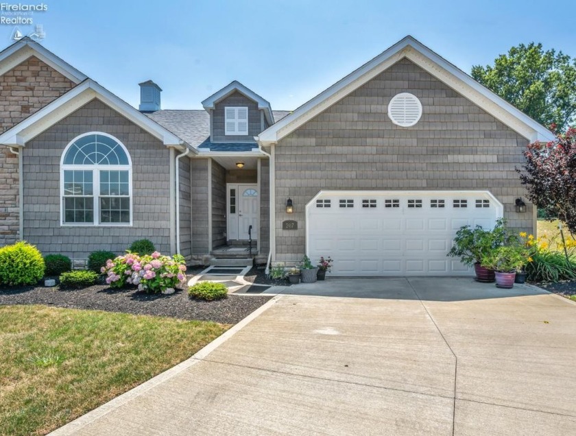 Welcome to lakeside living at its finest! This stunning 1-level - Beach Condo for sale in Vermilion, Ohio on Beachhouse.com