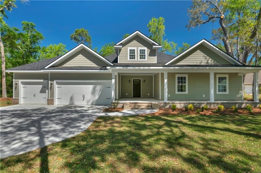 Welcome to this stunning 3,035 sq. ft. home nestled in the - Beach Home for sale in Brunswick, Georgia on Beachhouse.com