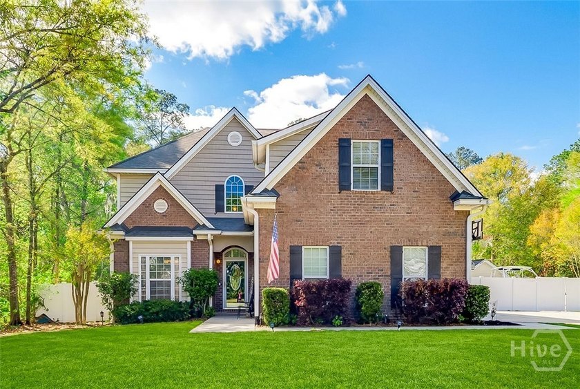 Tucked away on over half an acre in the quiet Hampton - Beach Home for sale in Richmond Hill, Georgia on Beachhouse.com
