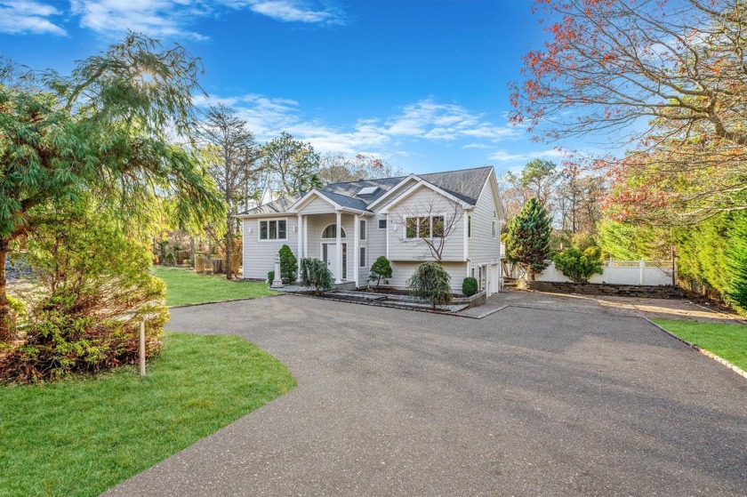 Welcome to this fully renovated, privately gated home located in - Beach Home for sale in Hampton Bays, New York on Beachhouse.com