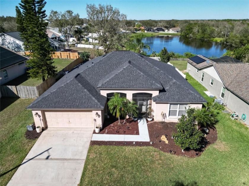 WITH A VA-BUYER APPRAISAL AT $490,000, THIS PONDFRONT POOL HOME - Beach Home for sale in Riverview, Florida on Beachhouse.com