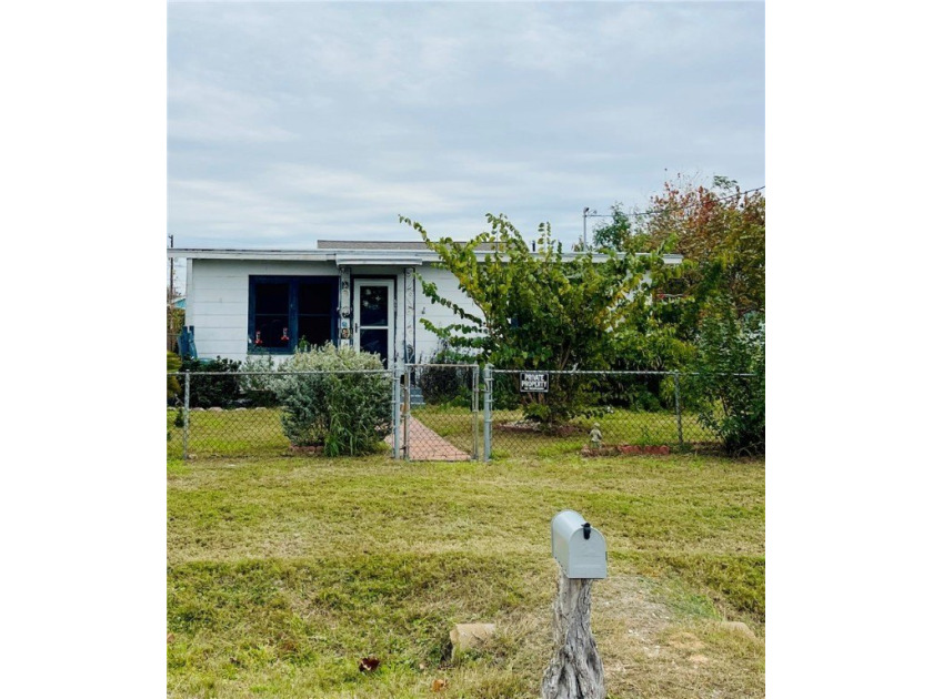 Nestled in a charming Coastal town by the Gulf waters, this - Beach Home for sale in Rockport, Texas on Beachhouse.com