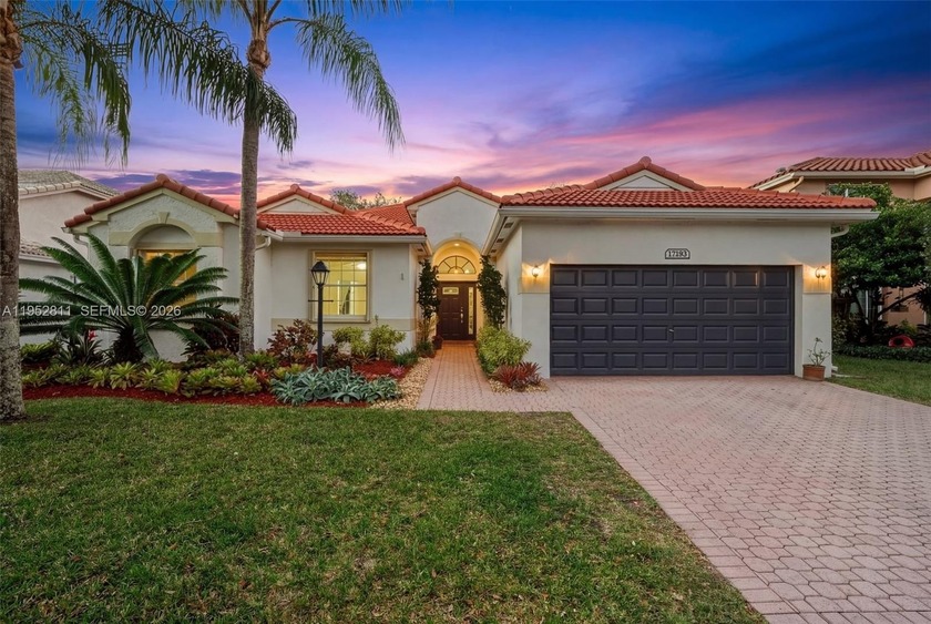 TURN KEY Newport Model with LAKE & POOL in prestigious Pembroke - Beach Home for sale in Pembroke Pines, Florida on Beachhouse.com