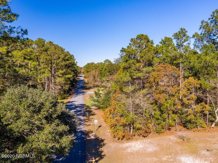 Nice sized wooded lot in a beautiful neighborhood. Convenient to - Beach Lot for sale in Minnesott Beach, North Carolina on Beachhouse.com