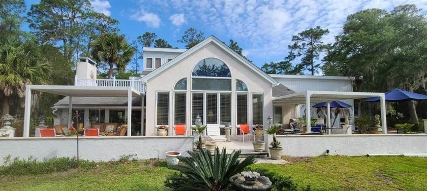 This Saint Simons Island contemporary style custom home offers - Beach Home for sale in Saint Simons, Georgia on Beachhouse.com