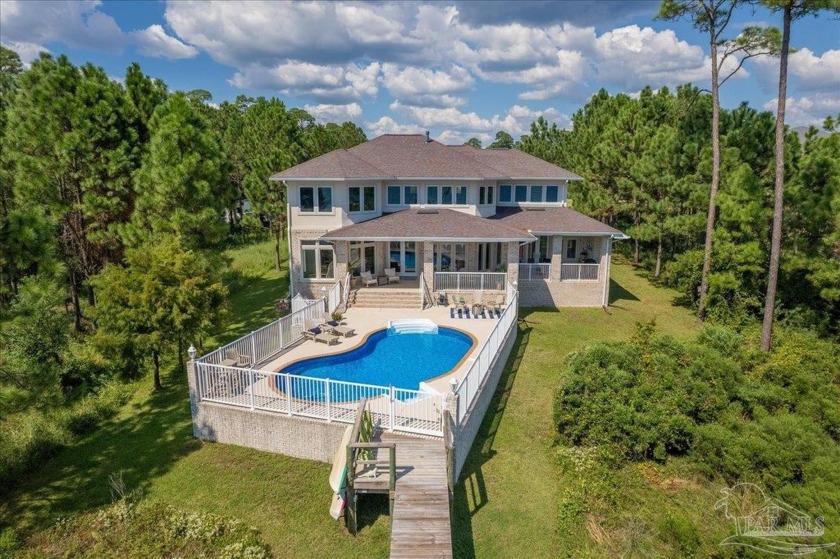 Welcome to your ideal Waterfront retreat! Impressive 5 bedroom - Beach Home for sale in Navarre, Florida on Beachhouse.com