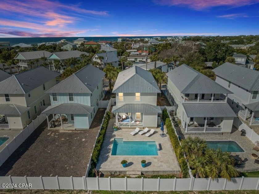 Welcome to your coastal paradise! This stunning 4-bedroom, 3 - Beach Home for sale in Panama City Beach, Florida on Beachhouse.com