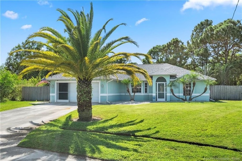 Step into this inviting 3-bedroom, 2-bath CBS home on a quiet - Beach Home for sale in Port Saint Lucie, Florida on Beachhouse.com