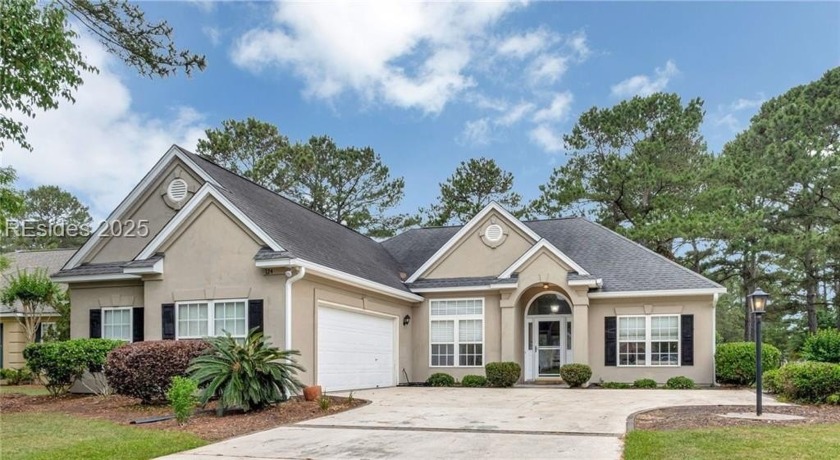 This 3-bedroom home with an office and a sunroom offers a split - Beach Home for sale in Okatie, South Carolina on Beachhouse.com