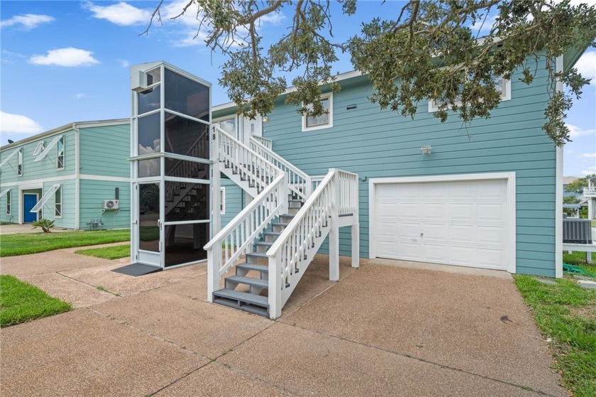 This beautifully remodeled canal-front retreat home offers you - Beach Home for sale in Rockport, Texas on Beachhouse.com