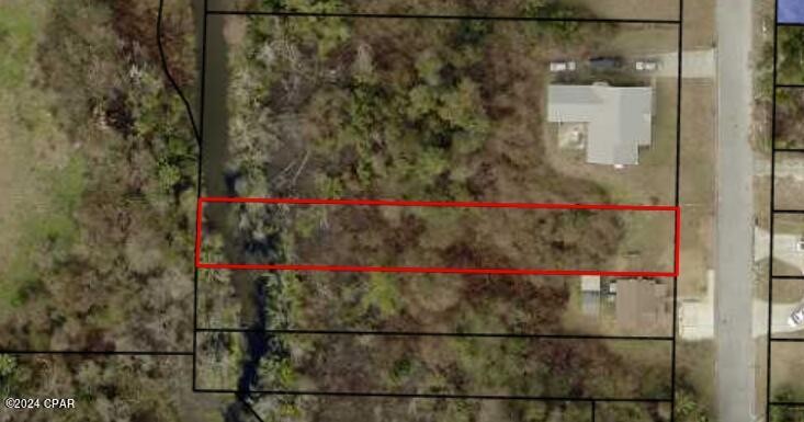 Explore the potential of this excellent building lot situated - Beach Lot for sale in Panama City, Florida on Beachhouse.com