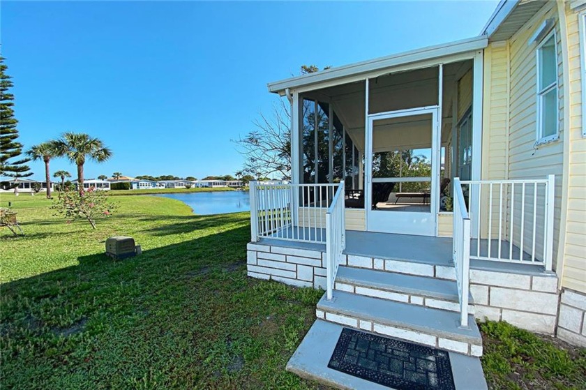 Home sweet home! 55+ community home with lake/pond view offering - Beach Home for sale in Micco, Florida on Beachhouse.com