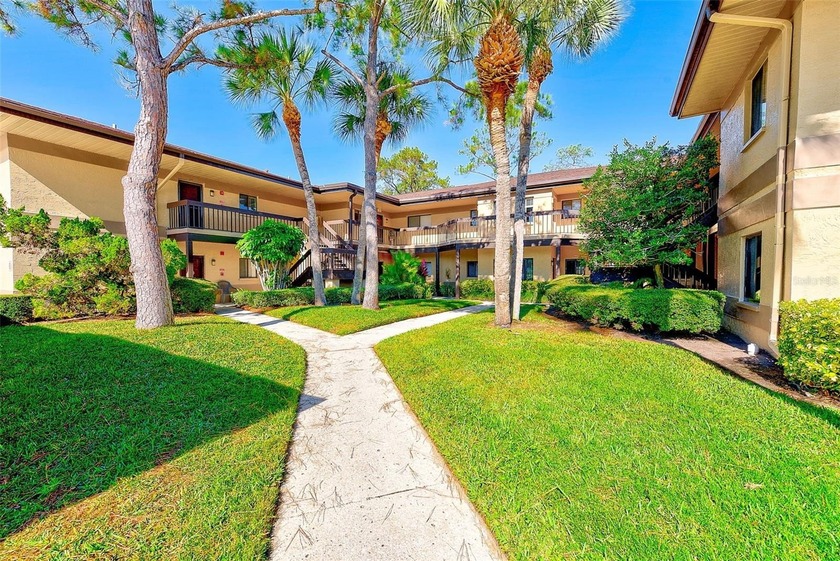 Welcome to 2685 Sabal Springs Circle, Unit 202--an inviting - Beach Condo for sale in Clearwater, Florida on Beachhouse.com