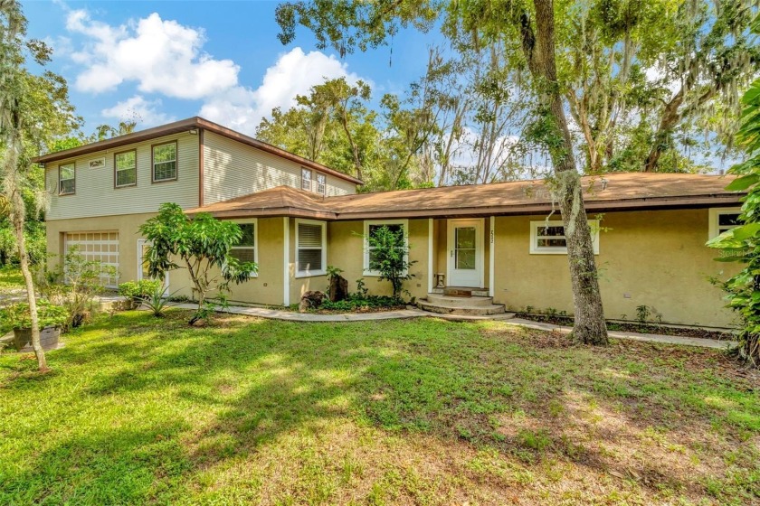 Riverside Retreat with Unique Manatee Touches on Over an Acre! - Beach Home for sale in Riverview, Florida on Beachhouse.com