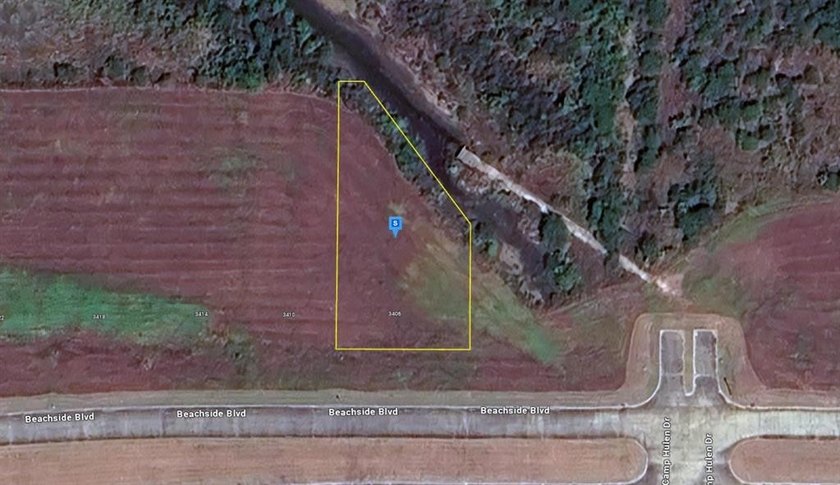 This 0.43-acre vacant lot is located in the gated Beachside - Beach Lot for sale in Palacios, Texas on Beachhouse.com