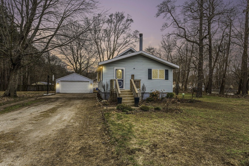 Steps from Peach Plains Elementary, this 3-bedroom, 1-bath home - Beach Home for sale in Grand Haven, Michigan on Beachhouse.com