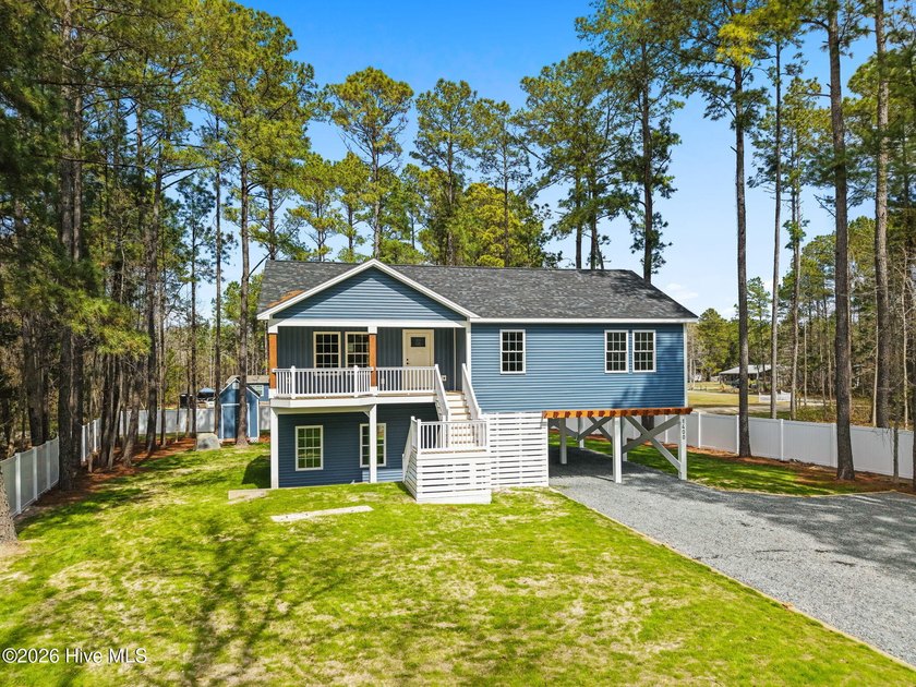 Welcome to Modern Comfort with a Tranquil Setting. Located just - Beach Home for sale in Supply, North Carolina on Beachhouse.com