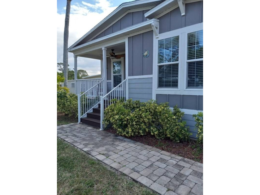 This 3 bedroom 2 bath manufactured home offers an ideal - Beach Home for sale in Melbourne, Florida on Beachhouse.com