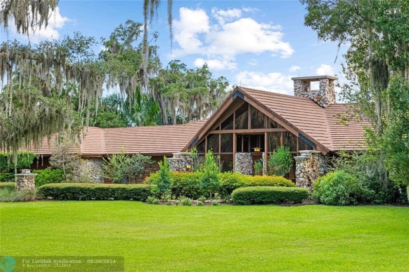 This luxurious cedar and stone riverfront lodge located on the - Beach Home for sale in Fort Pierce, Florida on Beachhouse.com