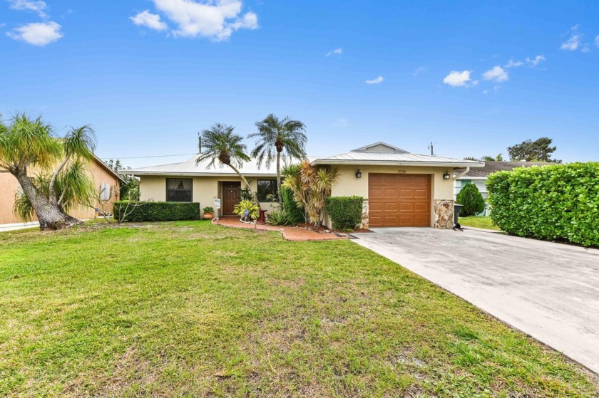 New Metal Roof! New AC! New Impact Windows! Pool! This home has - Beach Home for sale in Lake Worth, Florida on Beachhouse.com