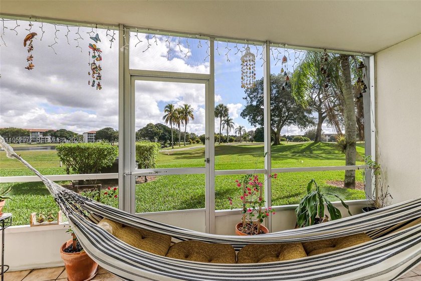 First-floor Corner 2BD/2BA unit featuring laminate wood flooring - Beach Condo for sale in Pembroke Pines, Florida on Beachhouse.com