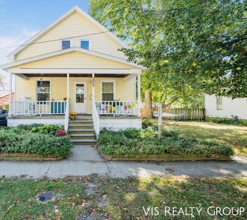 Are you looking for a home with a charming front porch in the - Beach Home for sale in Spring Lake, Michigan on Beachhouse.com