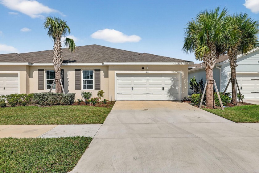 Modern 2023 Lake View Villa with Screened Lanai and Fenced Yard! - Beach Home for sale in Fort Pierce, Florida on Beachhouse.com