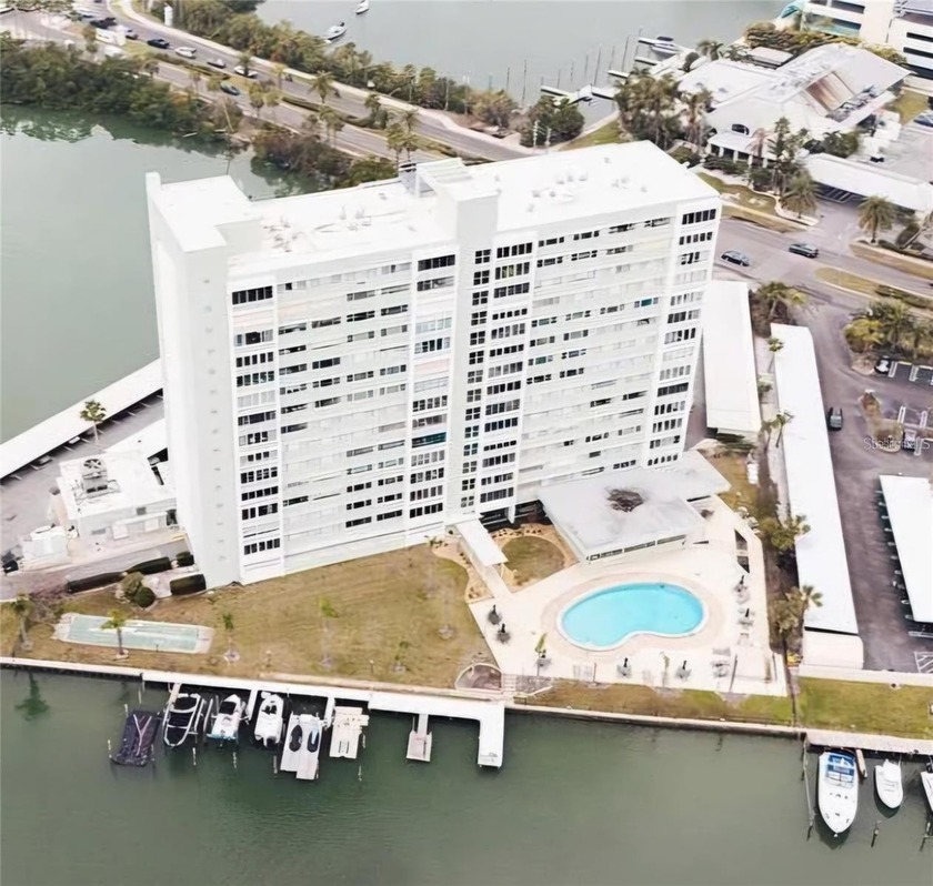 This stunning two-bedroom, one-bathroom condo with breathtaking - Beach Condo for sale in Clearwater Beach, Florida on Beachhouse.com