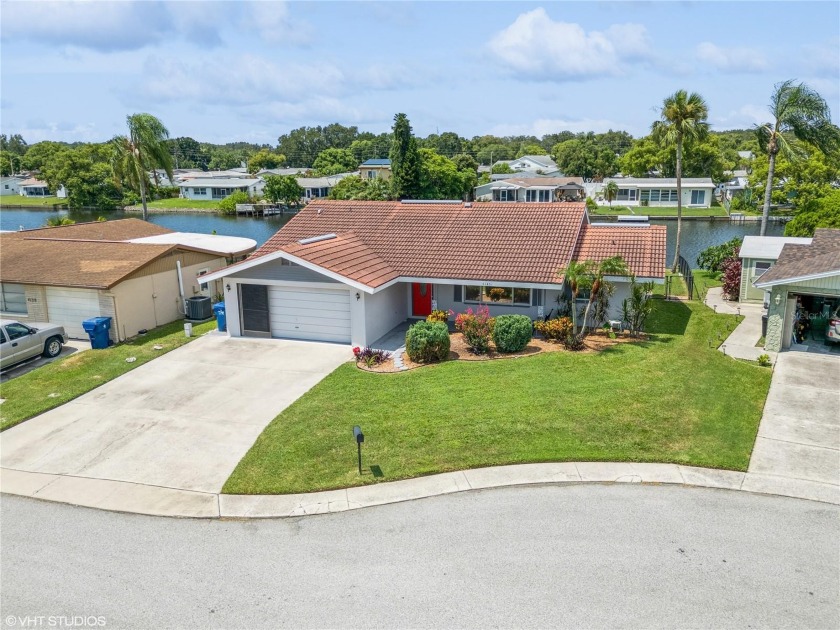 This updated waterfront home, is located in the desirable Aloha - Beach Home for sale in Holiday, Florida on Beachhouse.com