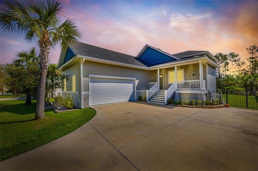 Experience the charm of high-quality construction in this - Beach Home for sale in Saint Simons, Georgia on Beachhouse.com