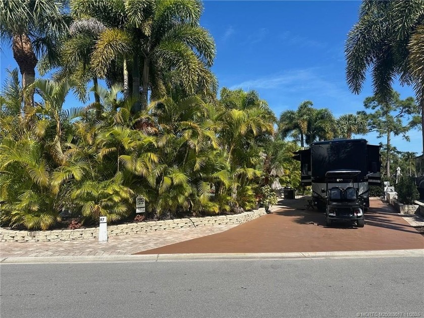 GREAT PRICE on this lush, turnkey corner lot overlooking the - Beach Lot for sale in Port Saint Lucie, Florida on Beachhouse.com