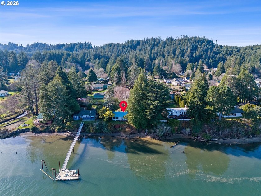 Offered for the first time, this cherished riverfront legacy - Beach Home for sale in Waldport, Oregon on Beachhouse.com