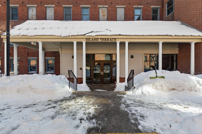 Perched in the iconic, beautifully converted brick mill, this - Beach Condo for sale in Saco, Maine on Beachhouse.com