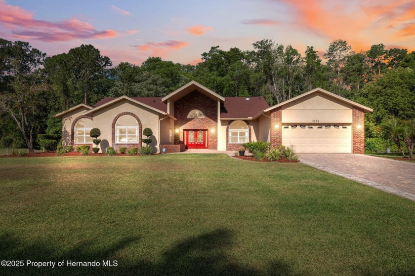 Step into timeless elegance in this expansive over-3,300 sq ft - Beach Home for sale in Weeki Wachee, Florida on Beachhouse.com