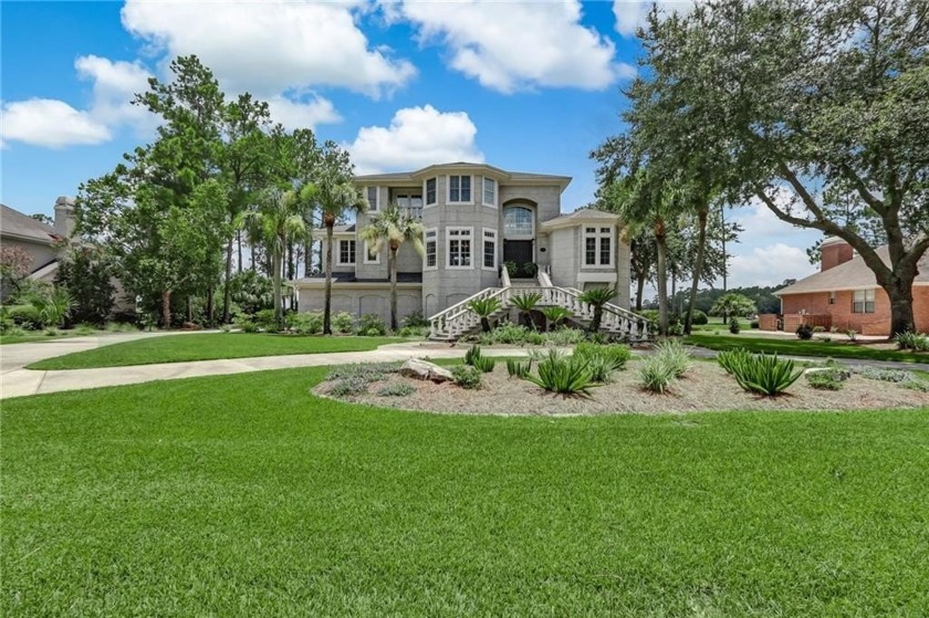 This stunning golf and marsh/river front residence built by - Beach Home for sale in Saint Marys, Georgia on Beachhouse.com