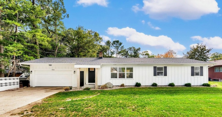 Welcome to this beautifully remodeled home in the heart of - Beach Home for sale in Spring Lake, Michigan on Beachhouse.com