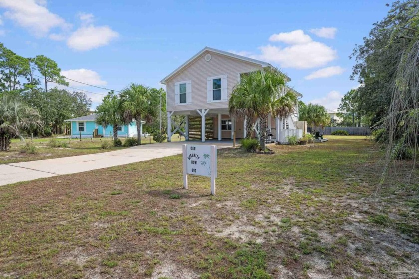 The perfect coastal retreat! Located just a short walk or golf - Beach Home for sale in Gulf Shores, Alabama on Beachhouse.com