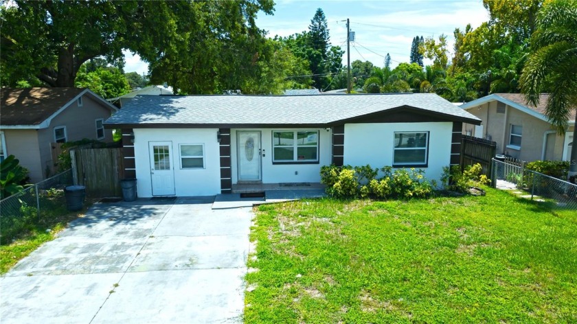 Stunning 4-Bedroom Home in Gulfport with Modern Upgrades and a - Beach Home for sale in Gulfport, Florida on Beachhouse.com