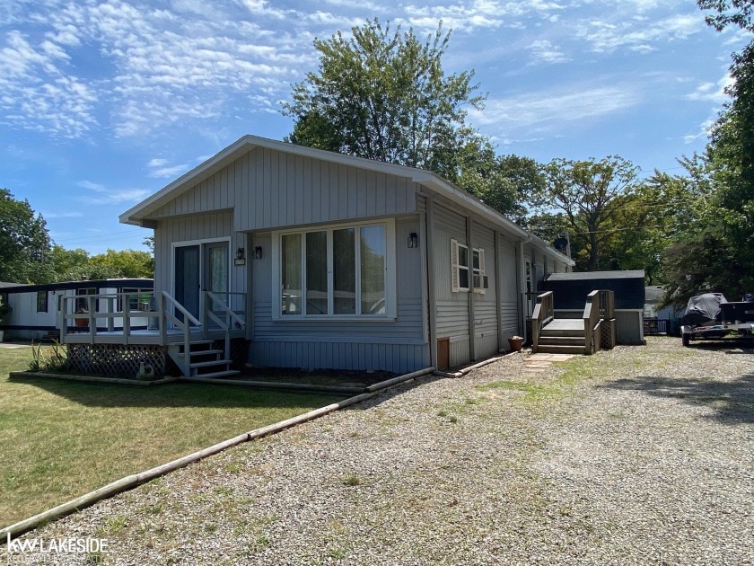 This well-maintained two-bedroom, one-bath home is move-in ready - Beach Home for sale in Caseville, Michigan on Beachhouse.com