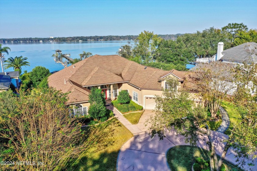 Endless sunsets on Dr's Lake. Open floor plan with owner's suite - Beach Home for sale in Fleming Island, Florida on Beachhouse.com