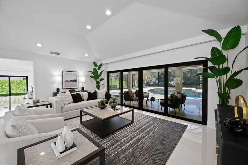 This one of a kind custom estate home in Breakers West Country - Beach Home for sale in West Palm Beach, Florida on Beachhouse.com