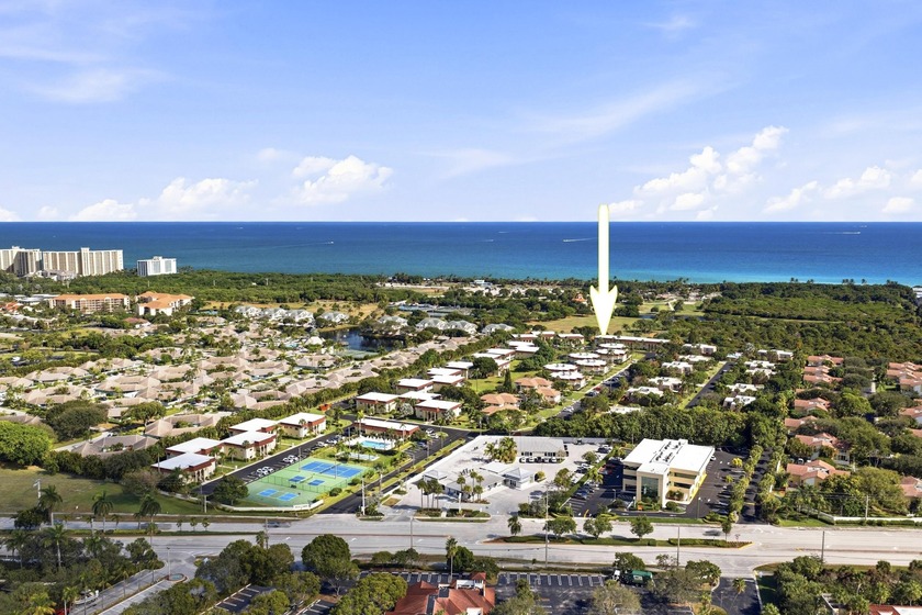 Location! Location!  Overlooking Carlin Park and a short walk to - Beach Condo for sale in Jupiter, Florida on Beachhouse.com