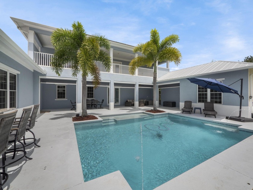 An exceptional four-bedroom, three-and-a-half-bath CBS pool - Beach Home for sale in Port Saint Lucie, Florida on Beachhouse.com