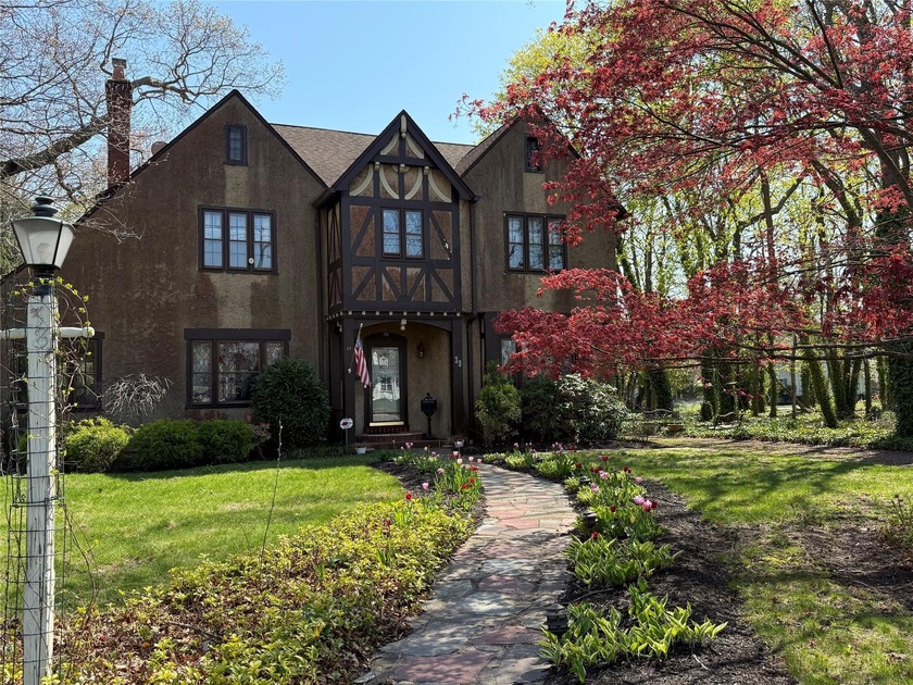 Step into timeless elegance with this grand 3,400 sq ft - Beach Home for sale in Patchogue, New York on Beachhouse.com