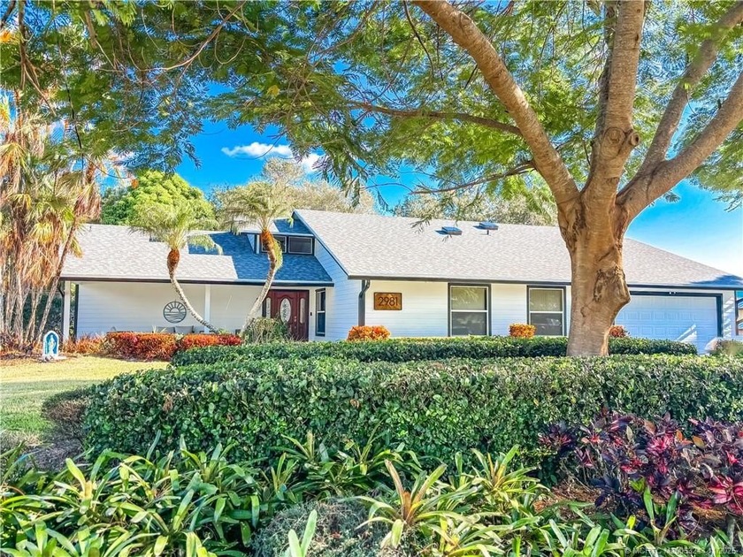 Welcome home to this wonderful 4-bed, 2-bath home in spacious - Beach Home for sale in Jensen Beach, Florida on Beachhouse.com