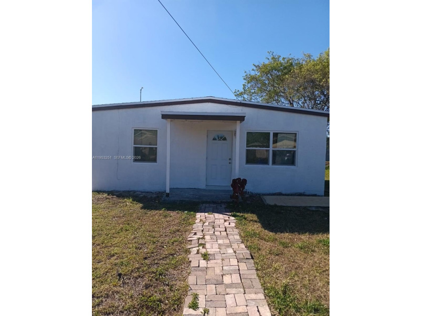 COMPLETELY REMODELED STARTER HOME. THIS 2/1 OFFERS NEW KITCHEN - Beach Home for sale in Pompano Beach, Florida on Beachhouse.com