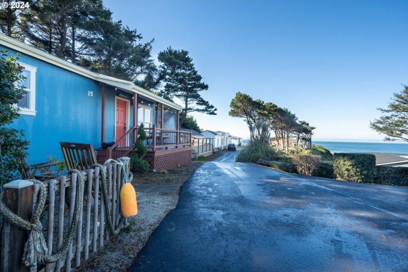 Introducing a charming oceanview oasis nestled in the Holiday - Beach Home for sale in Depoe Bay, Oregon on Beachhouse.com