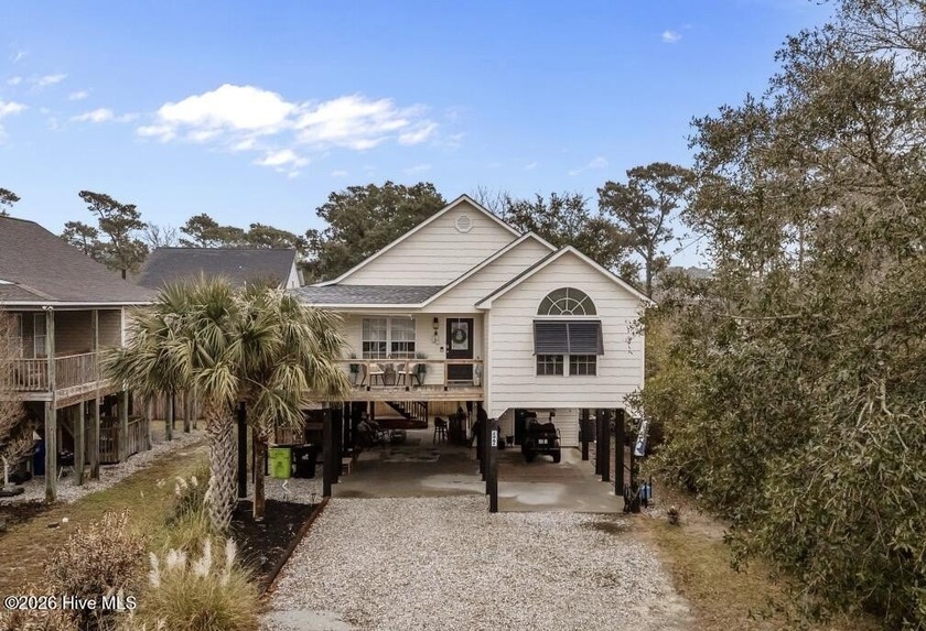 A Place to Coast-Perfectly situated on NE 63rd Street, this home - Beach Home for sale in Oak Island, North Carolina on Beachhouse.com