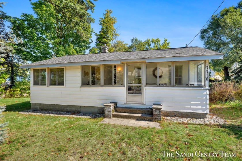 Strawberry Point - a delightful home or cottage nestled in the - Beach Home for sale in Spring Lake, Michigan on Beachhouse.com