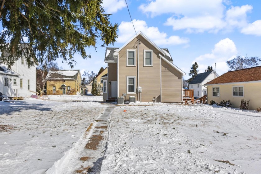 Fully Renovated Duplex - Turn-Key Opportunity! This stunning - Beach Home for sale in Port Washington, Wisconsin on Beachhouse.com